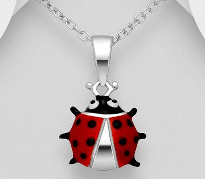 Sterling silver ladybug pendant decorated with colored enamel.
