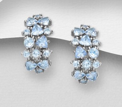 La Preciada - 925 Sterling Silver Omega-Lock Earrings, Decorated with Sky-Blue Topaz